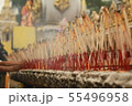 Worshiping Buddhist worship With incense candle 55496958
