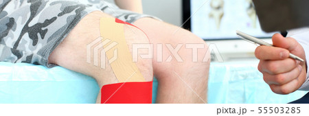 Patient with tied up knee 55503285