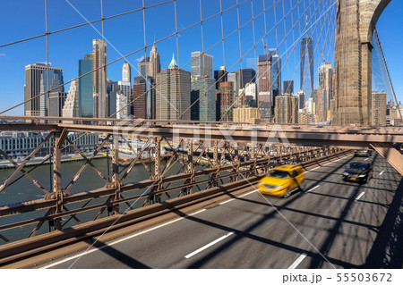 Traffic in morning rush hour before working day on the Brooklyn bridge over New York cityscape background, USA, United States, Business and transportation concept 55503672