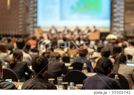 Rear view of Audience listening Speakers on the stage in the conference hall or seminar meeting, business and education about investment concept Rear view of Audience listening Speakers on the stage in the conference hall or seminar meeting, business and education about investment concept 55503742