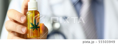 Male doctor hold bottle with marijuana oil 55503949