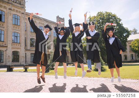 Students being excited graduating the university together. 55507258