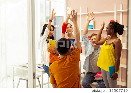 Pretty international woman spending time with her friends Pretty international woman spending time with her friends 55507710