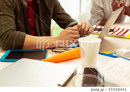 Modern young male person using gadgets during lesson Modern young male person using gadgets during lesson 55509441