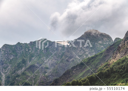 Clouds and fog on the slopes of mountain ranges 55510174
