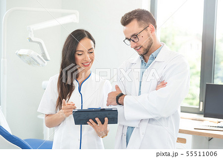 Medical workers working together in office Medical workers working together in office 55511006