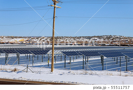 Solar panels in winter view of snow covered solar Solar panels in winter view of snow covered solar 55511757