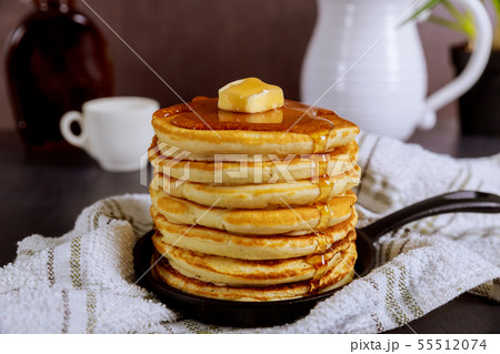 Sweet Homemade Stack of Pancakes with Butter and Sweet Homemade Stack of Pancakes with Butter and 55512074