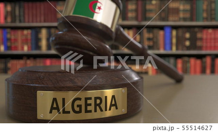 Flag of Algeria on judges gavel in court. National justice or jurisdiction related conceptual 3D Flag of Algeria on judges gavel in court. National justice or jurisdiction related conceptual 3D 55514627