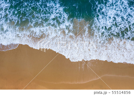 Aerial view of Blue ocean wave on sand beach. 55514856