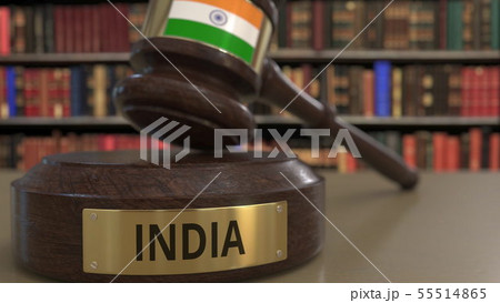Flag of India on falling judges gavel in court. National justice or jurisdiction related conceptual Flag of India on falling judges gavel in court. National justice or jurisdiction related conceptual 55514865