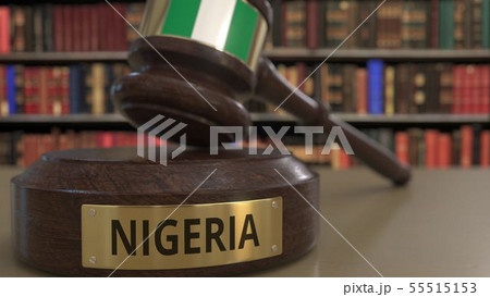 Flag of Nigeria on judges gavel in court. National justice or jurisdiction related conceptual 3D Flag of Nigeria on judges gavel in court. National justice or jurisdiction related conceptual 3D 55515153