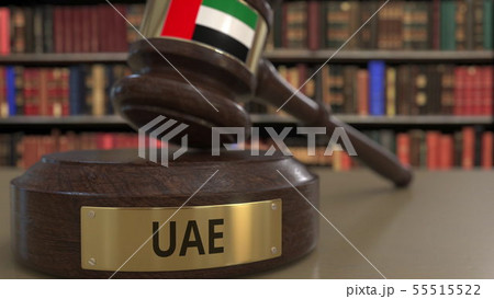 Flag of the United Arab Emirates UAE on judges gavel in court. National justice or jurisdiction Flag of the United Arab Emirates UAE on judges gavel in court. National justice or jurisdiction 55515522