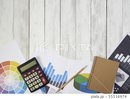 High Angle View Calculator On Documents On Table 55516974