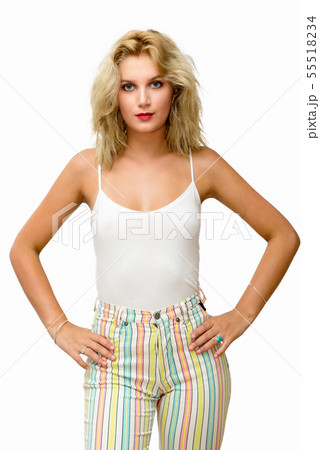 pretty young blond woman with tight pants 55518234