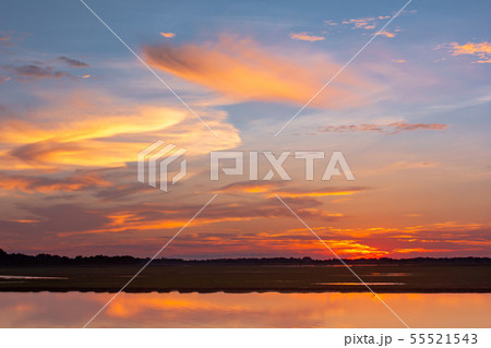 Sunset reflection lagoon. beautiful sunset behind Sunset reflection lagoon. beautiful sunset behind 55521543