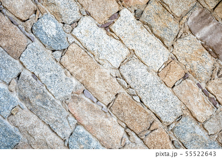 Texture of an irregular stone wall. Background. Texture of an irregular stone wall. Background. 55522643