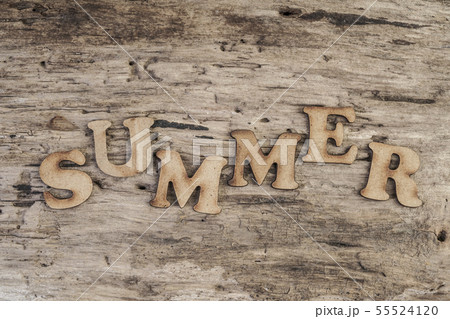 Word SUMMER on wooden background 55524120