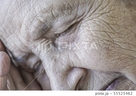 closeup face of a senior woman sleeping 55525462