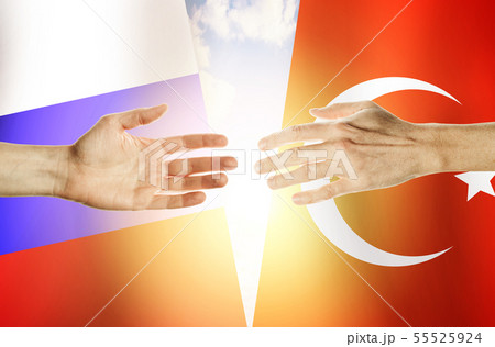 Two hands stretch towards each other against Two hands stretch towards each other against 55525924