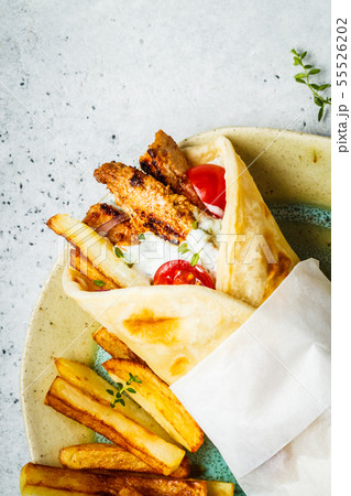 Gyros souvlaki wraps in pita bread with chicken 55526202