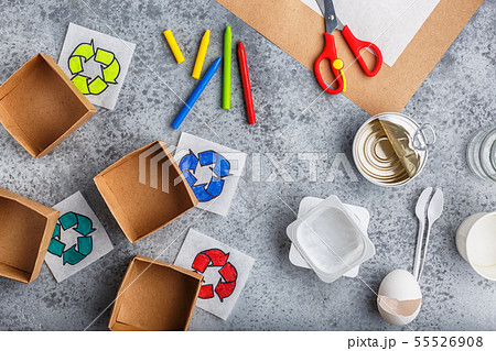 Kids hands is making recycling game kid is drawing recycle sign paper craft 55526908