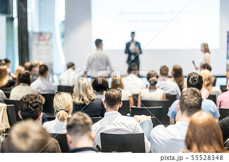 Male business speaker giving a talk at business conference event. 55528348