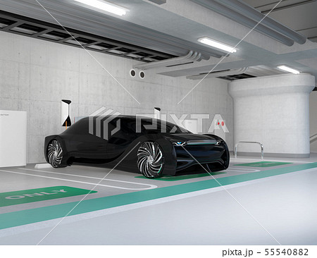 地下駐車場のチャージステーションに充電している電気自動車のイメージ 地下駐車場のチャージステーションに充電している電気自動車のイメージ 55540882