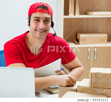 Call center worker at parcel distribution center in post office 55541217