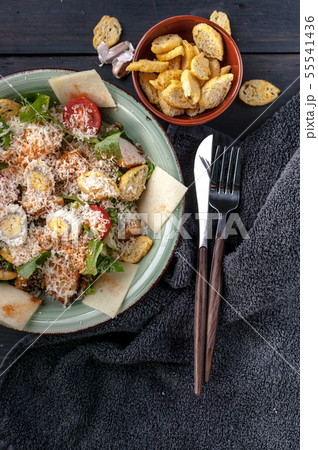 Close-Up Caesar salad with quail egg Close-Up Caesar salad with quail egg 55541436