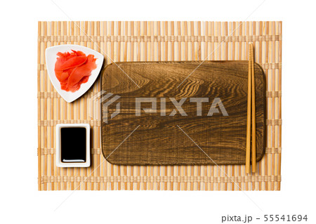 Empty rectangular brown wooden plate with 55541694