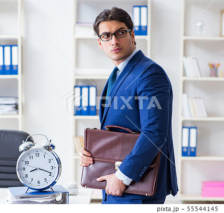 Businessman in bad time management concept 55544145