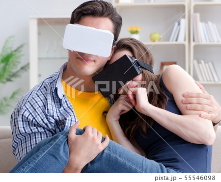 Young family playing games with virtual reality glasses 55546098