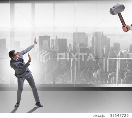 Bad angry boss threatening employee with hammer 55547726
