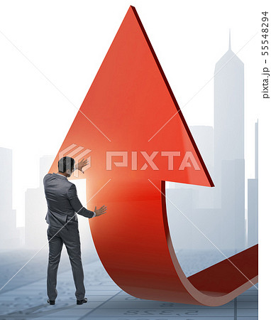 Businessman supporting growtn in economy on chart graph 55548294