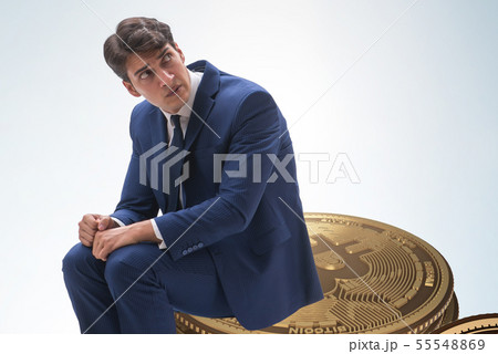 Businessman sad about bitcoin price crash 55548869