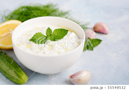 Greek dip sauce or dressing tzatziki. 55549532