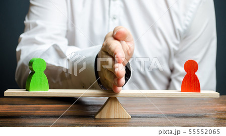A man divides with his palm two figures of people A man divides with his palm two figures of people 55552065