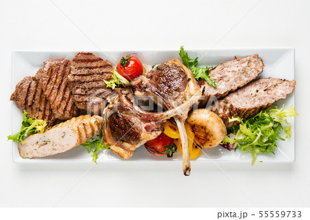meat appetizer on the white plate 55559733