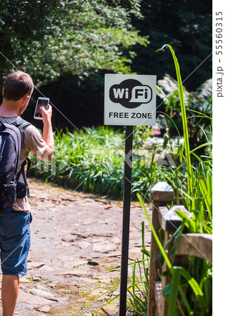 Batumi, Georgia, Sign of a wi-fi zone in the Batumi botanical garden Batumi, Georgia, Sign of a wi-fi zone in the Batumi botanical garden 55560315