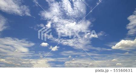 Blue sky background with clouds 55560631