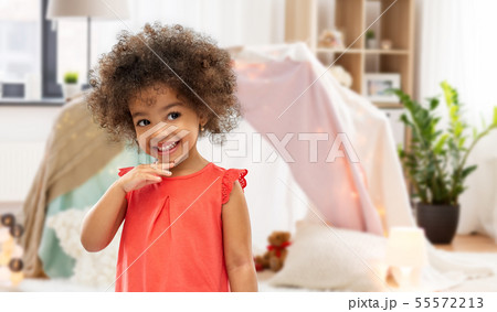 happy little african american girl at home 55572213