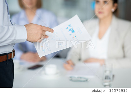 close up of businessman with charts at office close up of businessman with charts at office 55572953