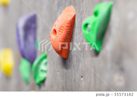 close up of rock holder on indoor climbing wall close up of rock holder on indoor climbing wall 55573102