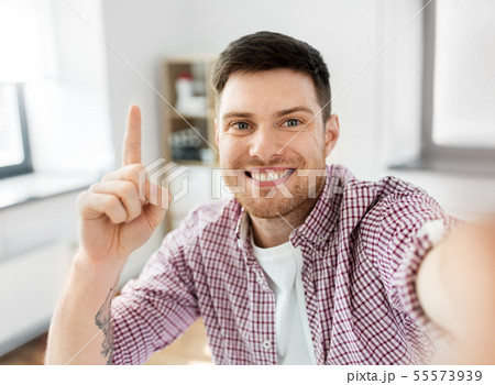 man or video blogger taking selfie man or video blogger taking selfie 55573939