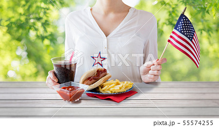 woman celebrating american independence day 55574255
