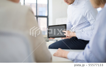 close up of business team with tablet pc at office close up of business team with tablet pc at office 55577133