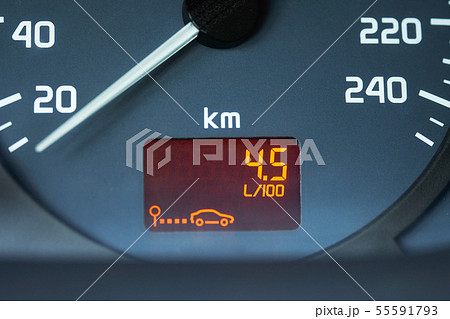 Low fuel consumption showed by the car on-board computer on the dashboard Low fuel consumption showed by the car on-board computer on the dashboard 55591793