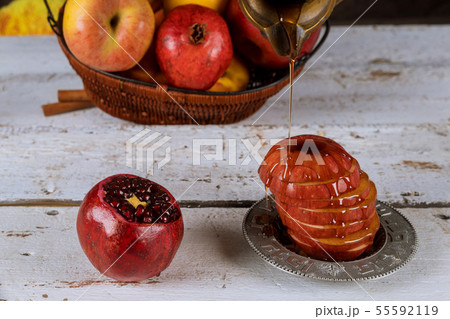 Honey, apple and pomegranate traditional holiday 55592119