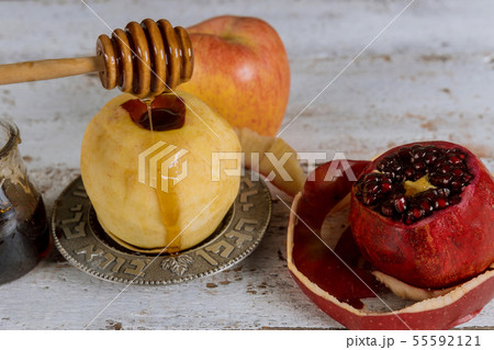 Jewish Holiday Rosh hashanah honey and apples with 55592121